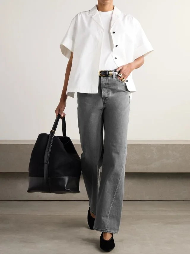 model wearing grey loose jeans