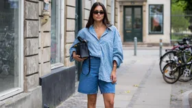Girl wearing denim shorts at fashion week