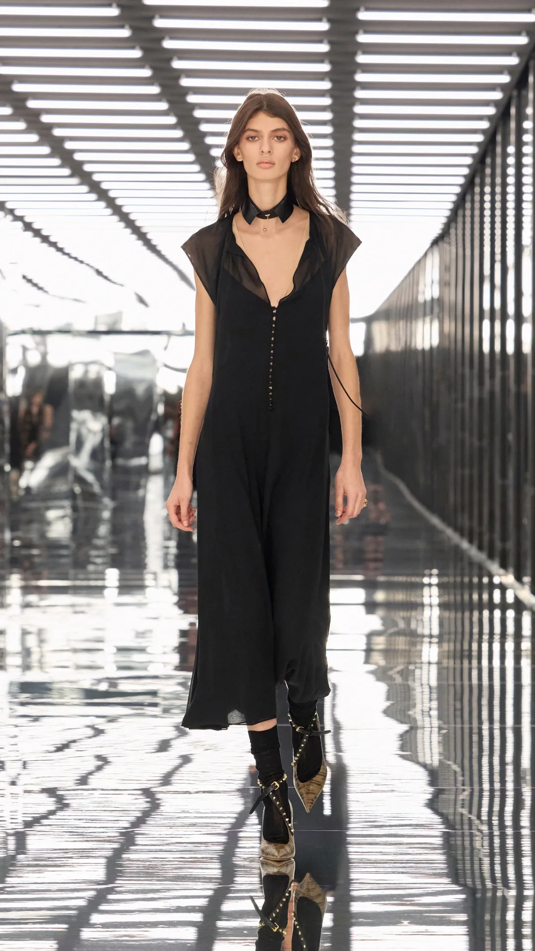 Model in a sheer black dress