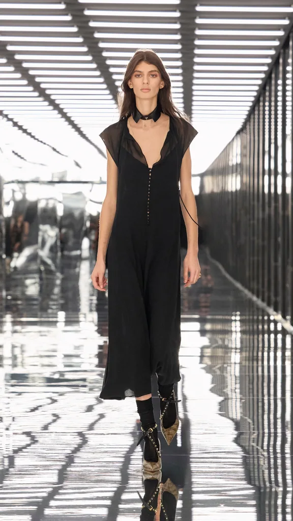 Model in a sheer black dress