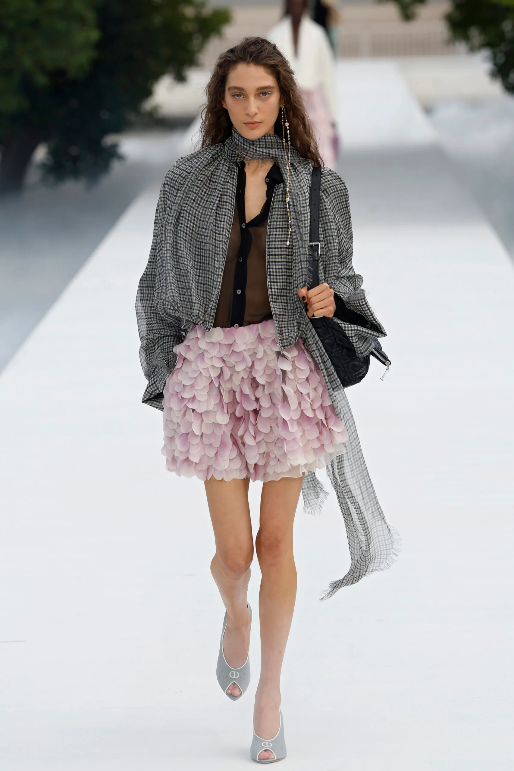 PARIS, FRANCE - SEPTEMBER 29: (EDITORIAL USE ONLY - For Non-Editorial use please seek approval from Fashion House) A model walks the runway during the Christian Dior Womenswear Spring/Summer 2027 show as part of Paris Fashion Week on September 29, 2026 in Paris, France. (Photo by Estrop/Getty Images)