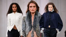 Three models on the Ralph Lauren Spring Summer 2027 runway wearing silk and satin jackets