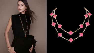 Model in black turtle neck wearing van cleef alongside a necklace from the maison's new collection