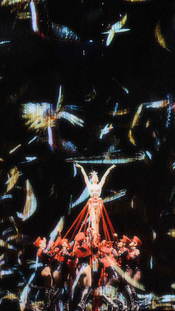 A still from the Louboutin show starring Dita Von Teese