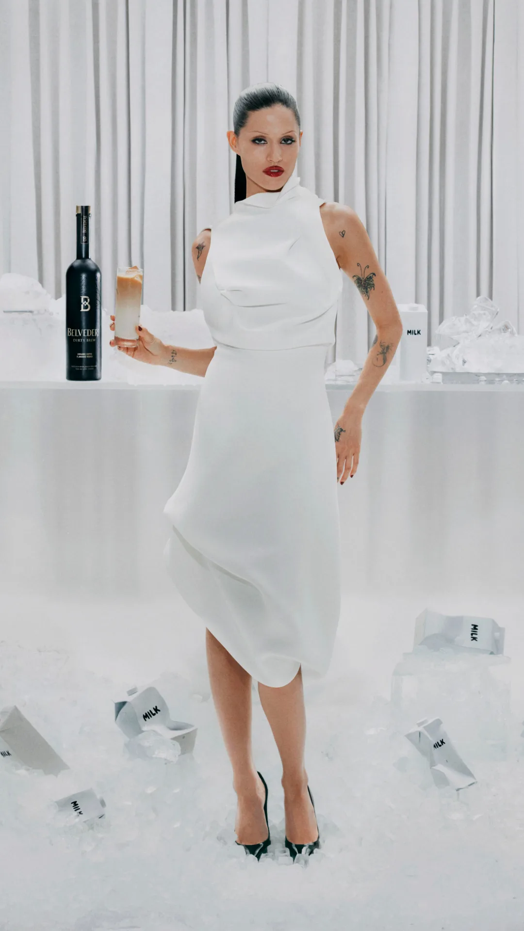 Gabbriette in a white dress