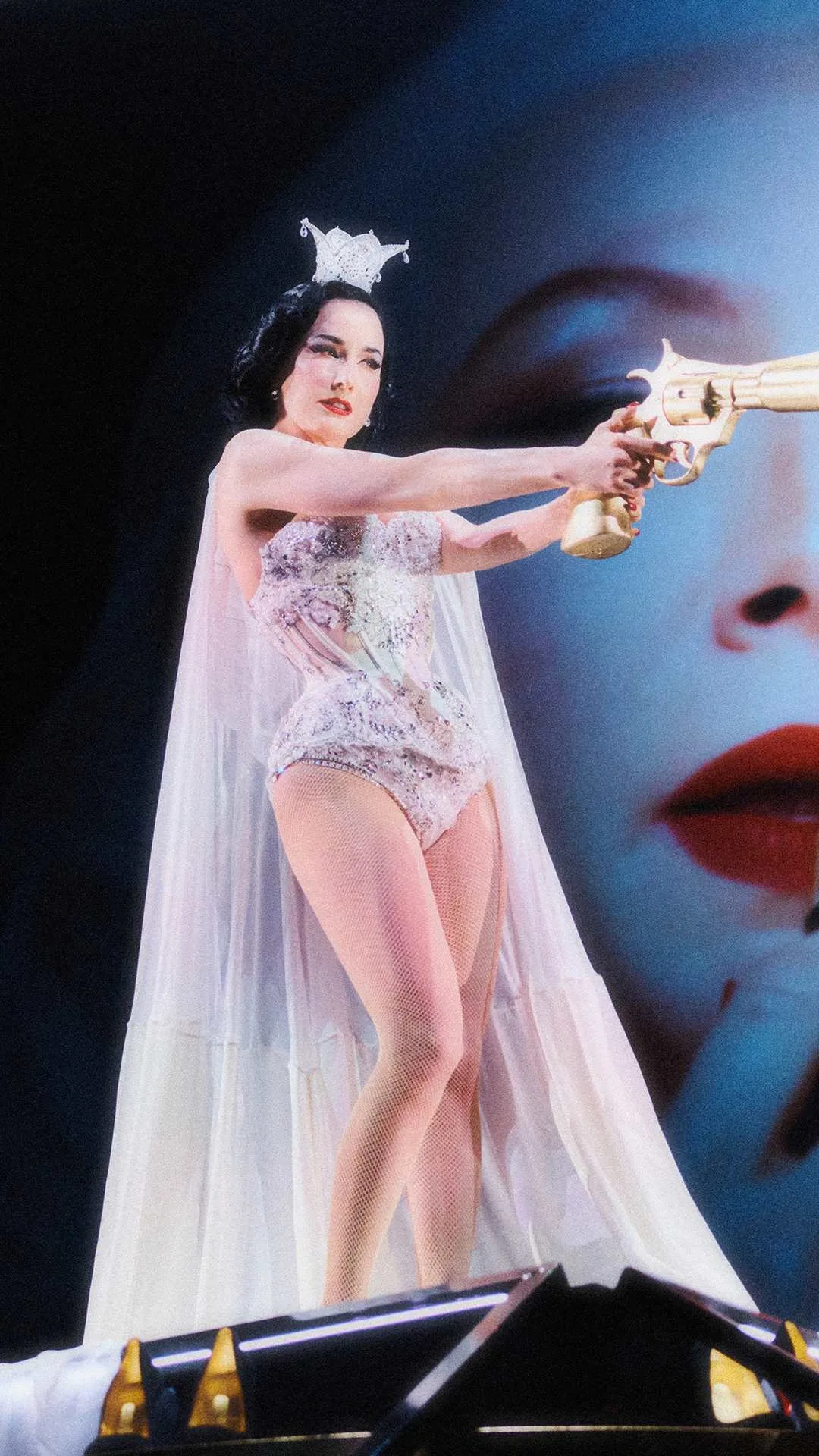 A still from the Louboutin show starring Dita Von Teese