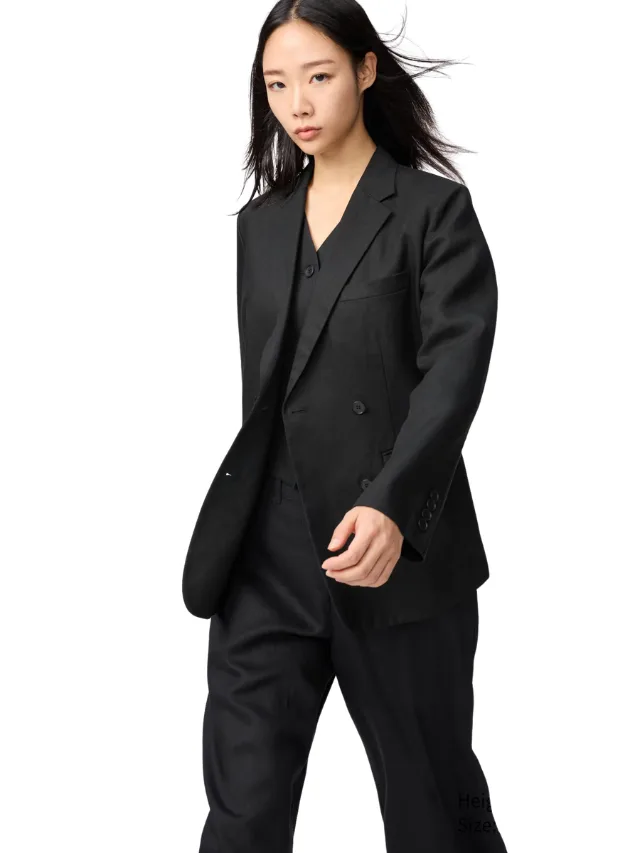 A model wearing a black jacket