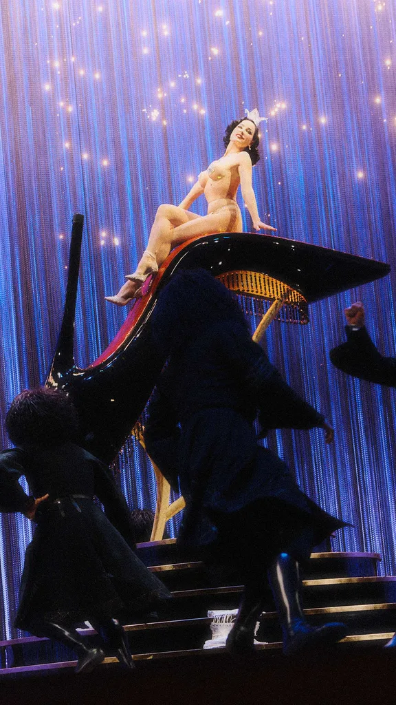 A still from the Louboutin show starring Dita Von Teese
