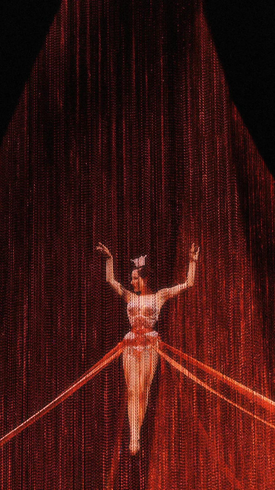 A still from the Louboutin show starring Dita Von Teese
