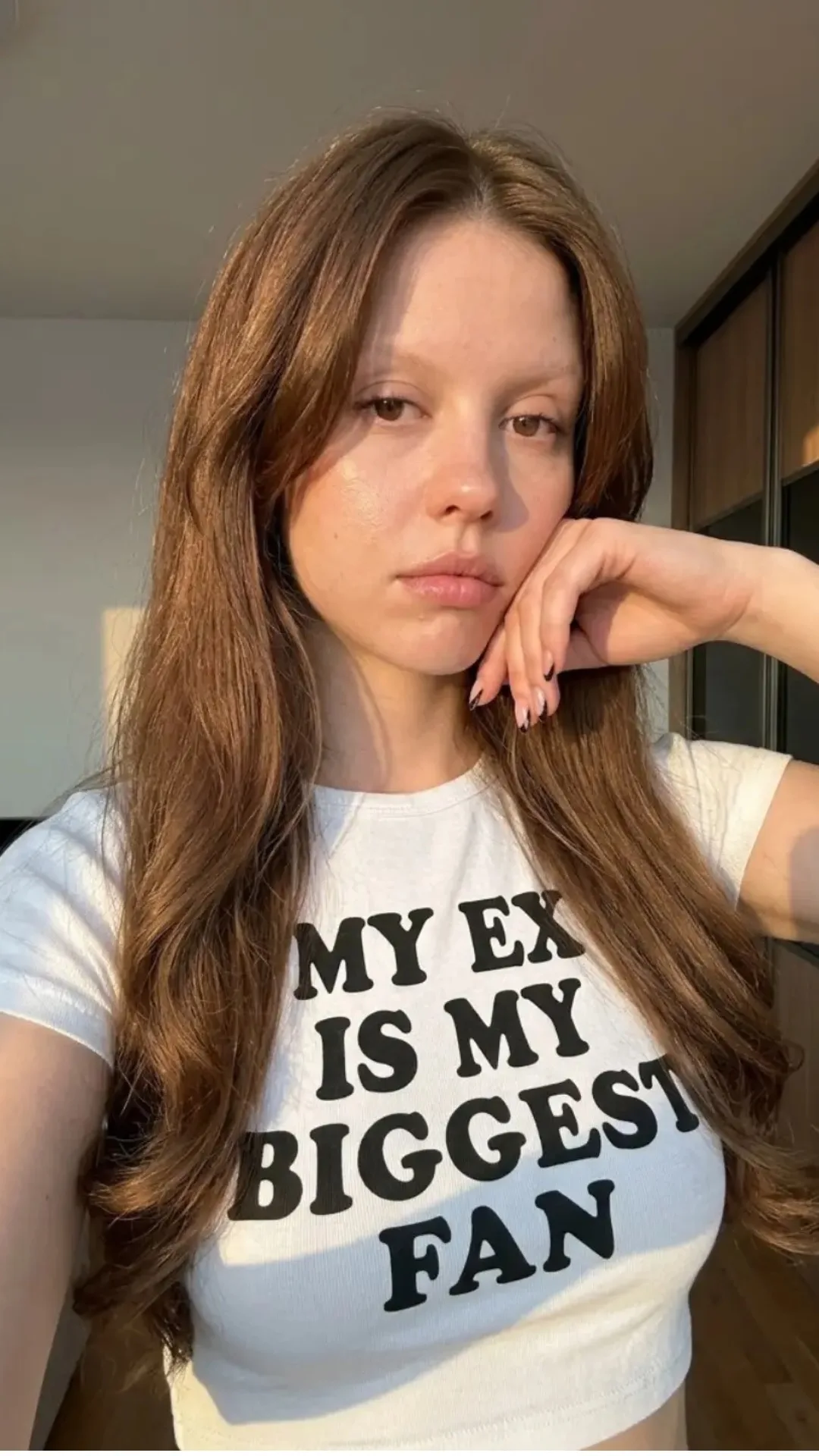 Mia Goth wearing a white graphic T-shirt