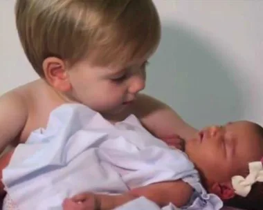 WATCH: Six Brothers Welcome Their First Sister