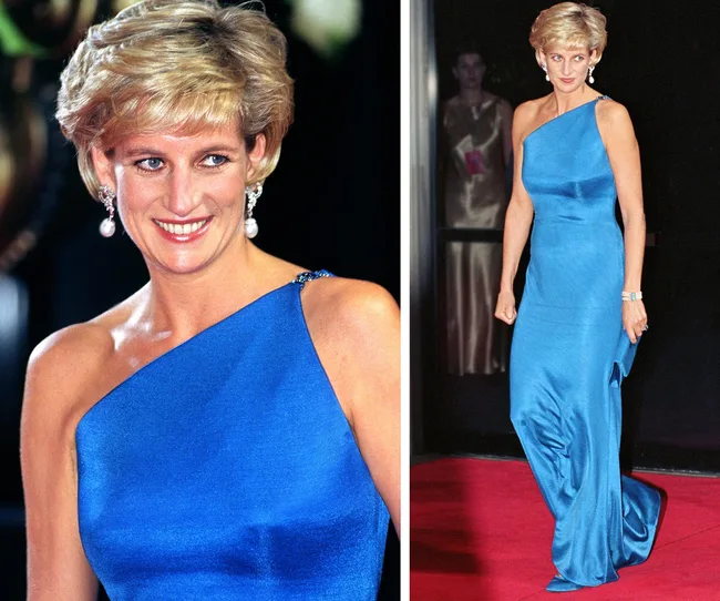"Princess Diana in a blue one-shoulder gown with short hairstyle at a formal event, smiling and walking on a red carpet."