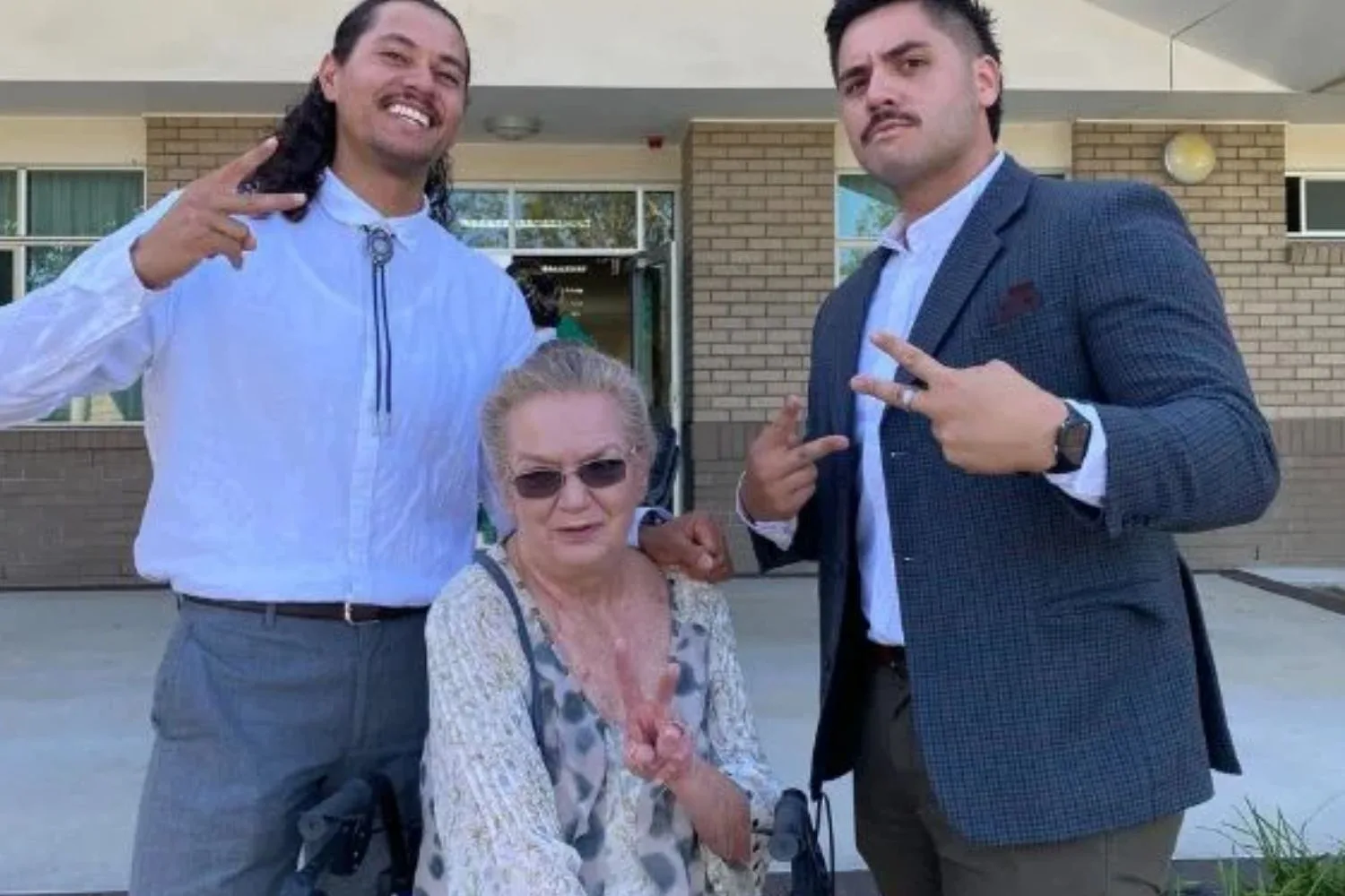 Rhonda (centre) with Myles (right) and Shem (left).