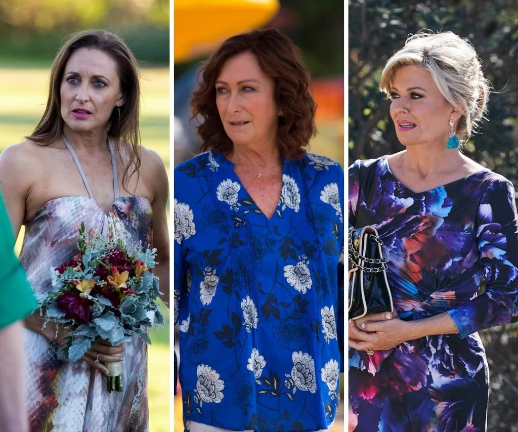 Georgie Parker, Lynne McGranger and Emily Symons on Home And Away looking concerned.