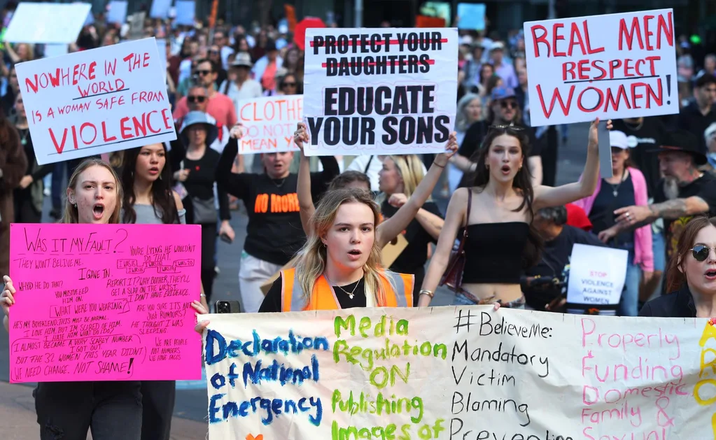 Crowds take to the streets to protest domestic violence