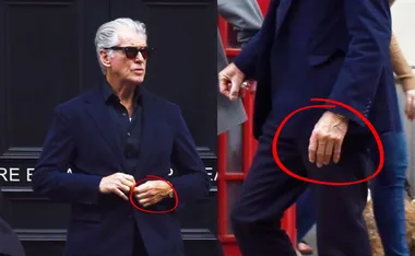 Pierce Brosnan in suit and sunglasses without his wedding ring