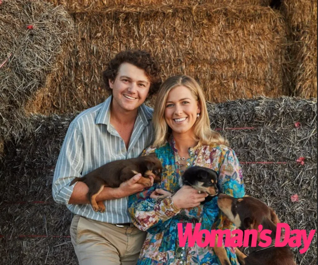 FWAW Dustin and Sophie hold puppies