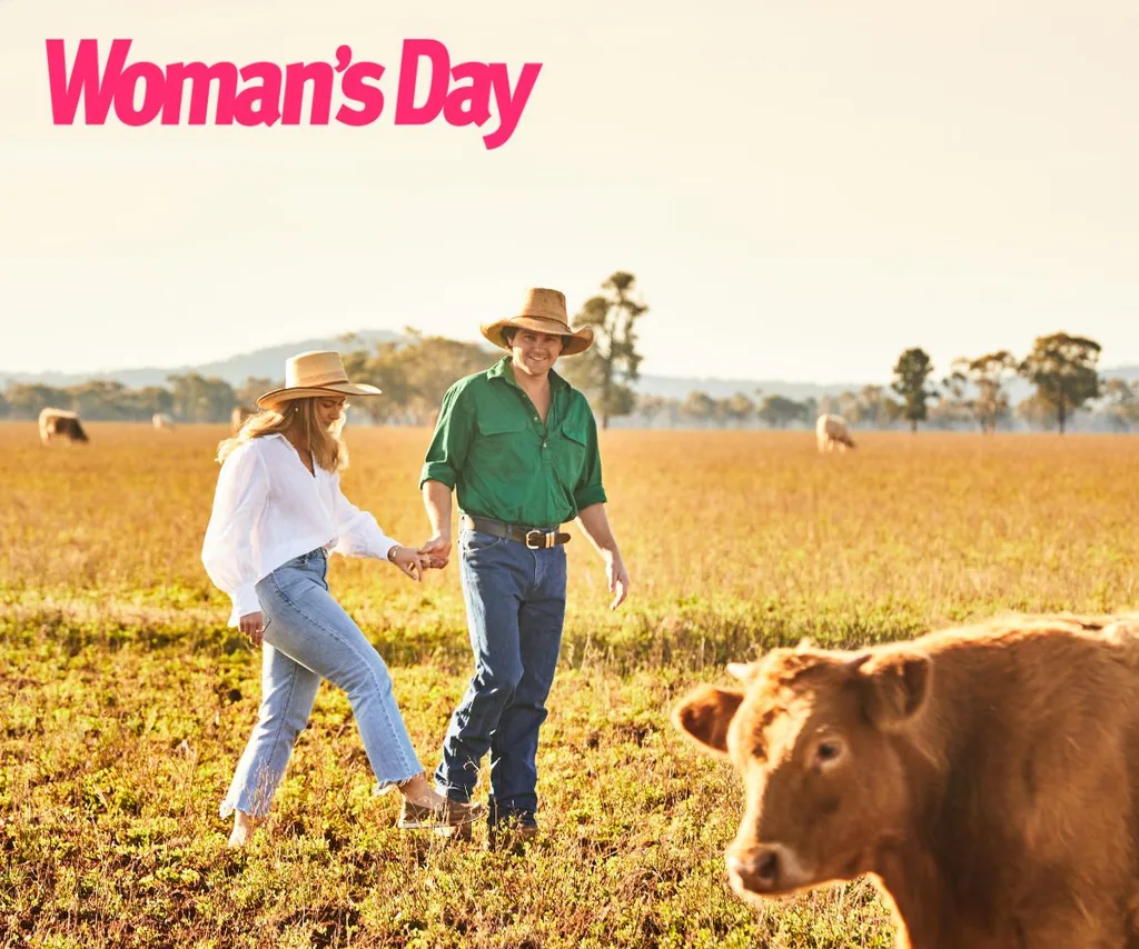 FWAW Dustin and Sophie hold hands as a cow looks at the camera