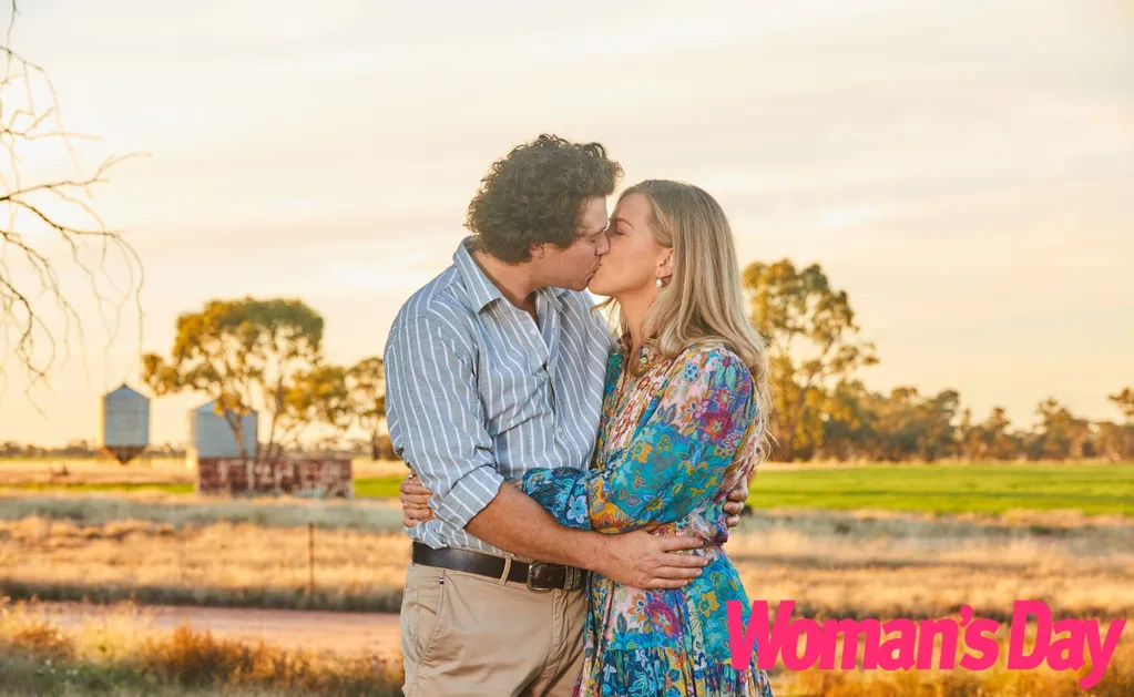 FWAW Dustin and Sophie share a kiss with farmland behind them