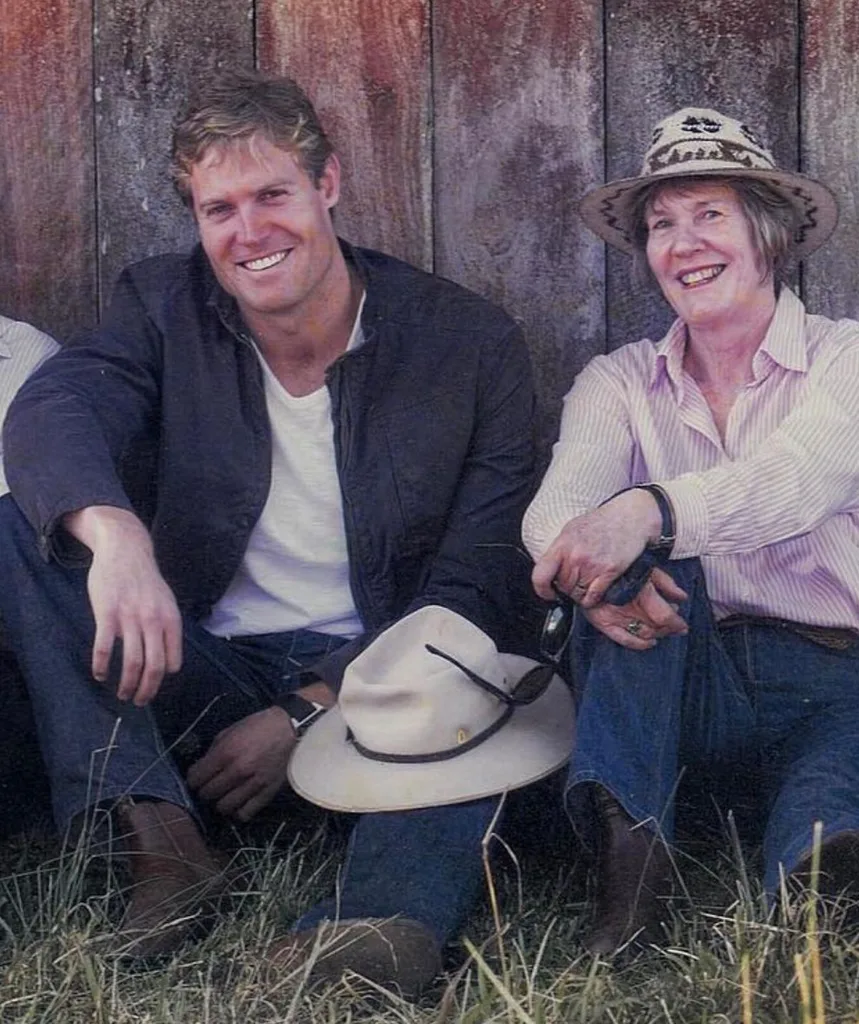 Dr Chris sits with his mother Anne, who is battling alzheimers. They look happy in the country.