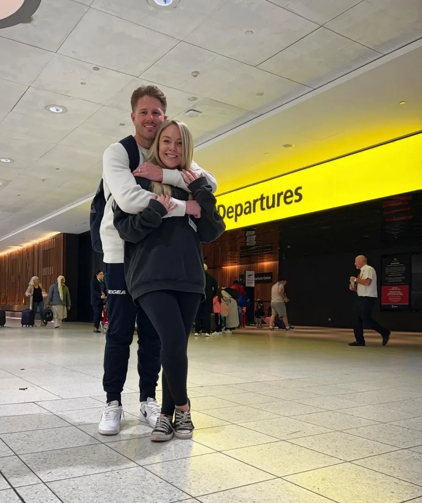 Bryce and Melissa embrace at the departures terminal before flying off to their honeymoon