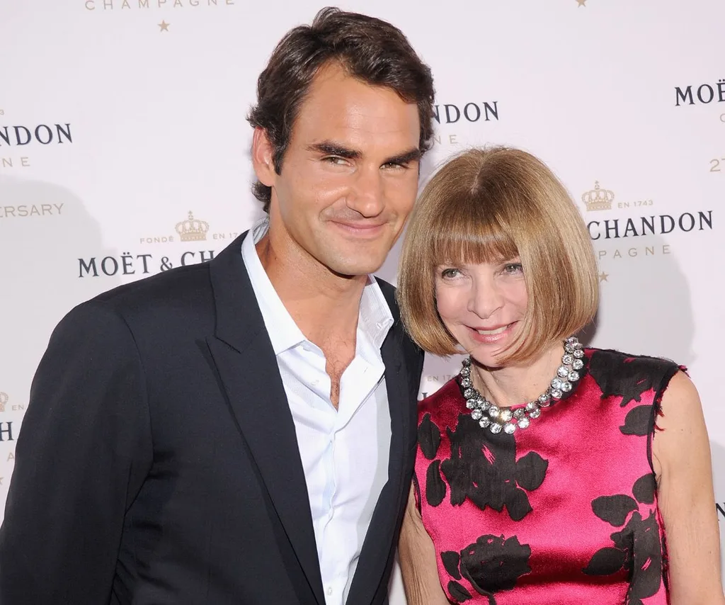 Roger federer and Anna Wintour smile, looking nice