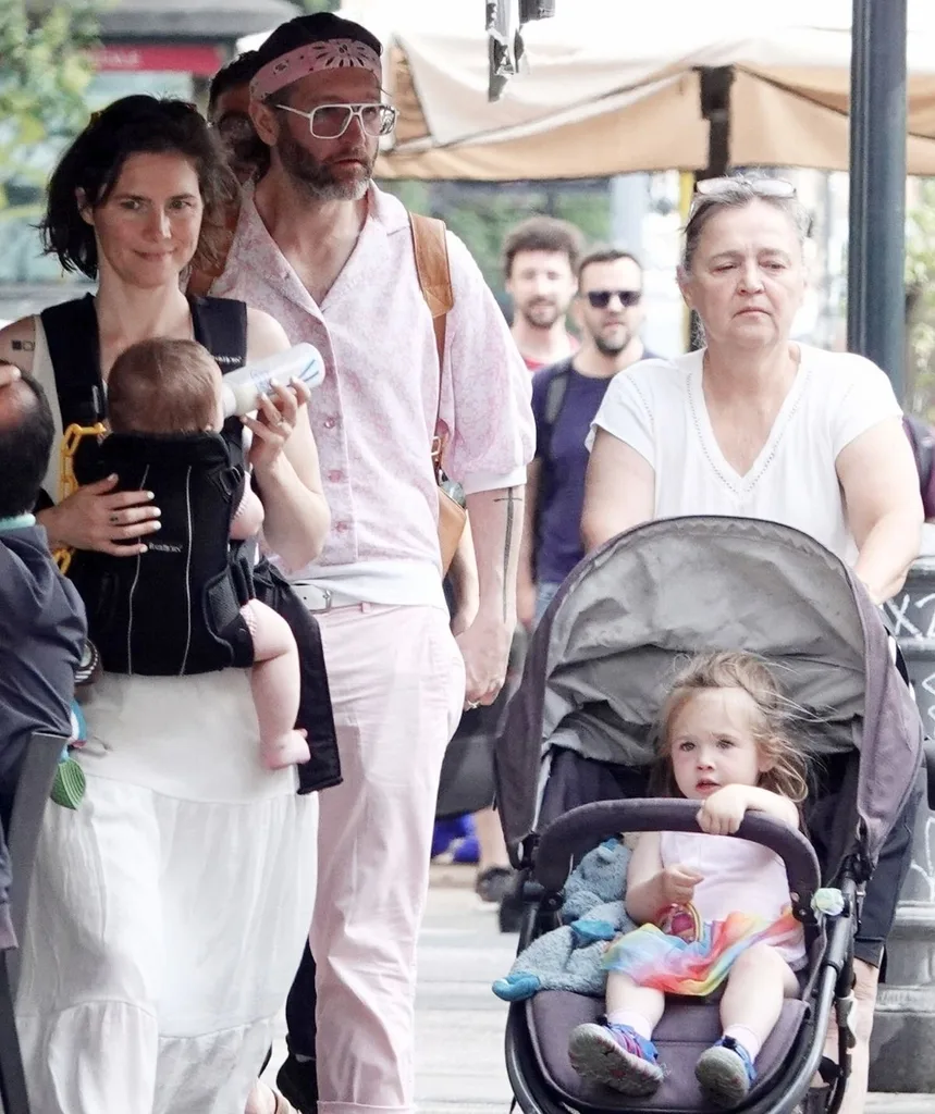 Amanda Knox with family walking through Italy