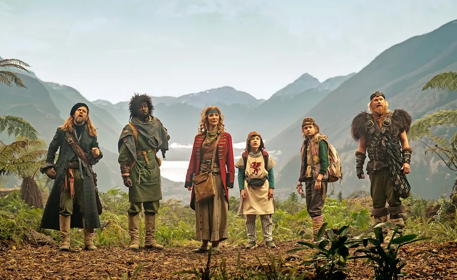 Time Bandits, a group of ragtag time travelling thieves on a mission pictured against a misty mountain range.