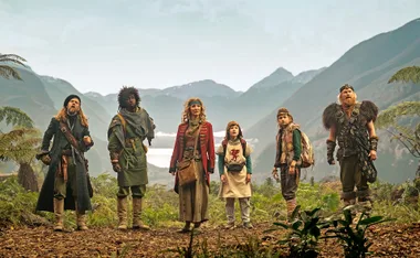 Time Bandits, a group of ragtag time travelling thieves on a mission pictured against a misty mountain range.