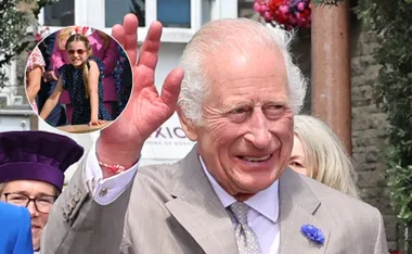 King Charles waves wearing a friendship bracelet likely from Princess Charlotte