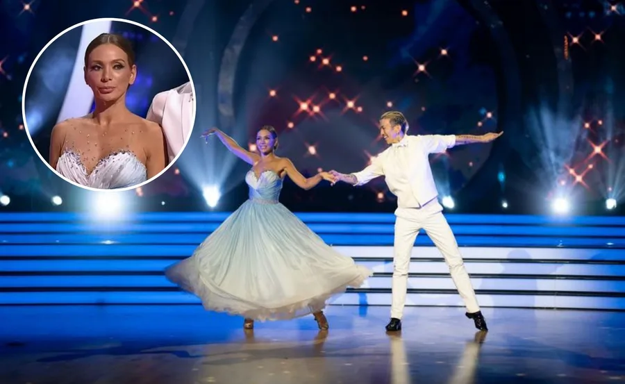 Nadia Bartel dancing her elimination dance on Dancing With The Stars in an ombre blue to white gown