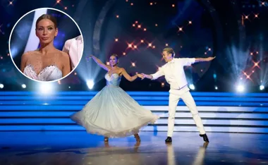 Nadia Bartel dancing her elimination dance on Dancing With The Stars in an ombre blue to white gown