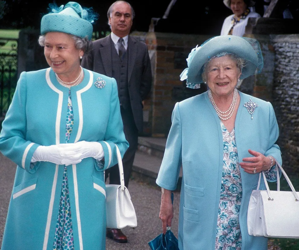 Queen Elizabeth and Queen Mother look pretty in matching blue, smiling