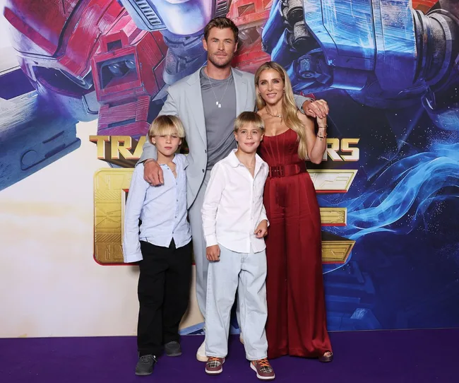 chris hemsworth, elsa pataki and twin boys look nice at transformer's Australian premier.