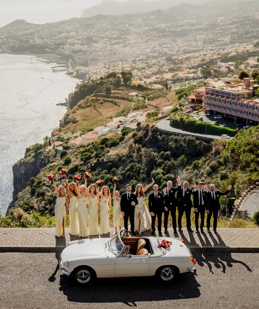 Maria Vanuti's daughter and the wedding party on the cliffs near the Portugal location.