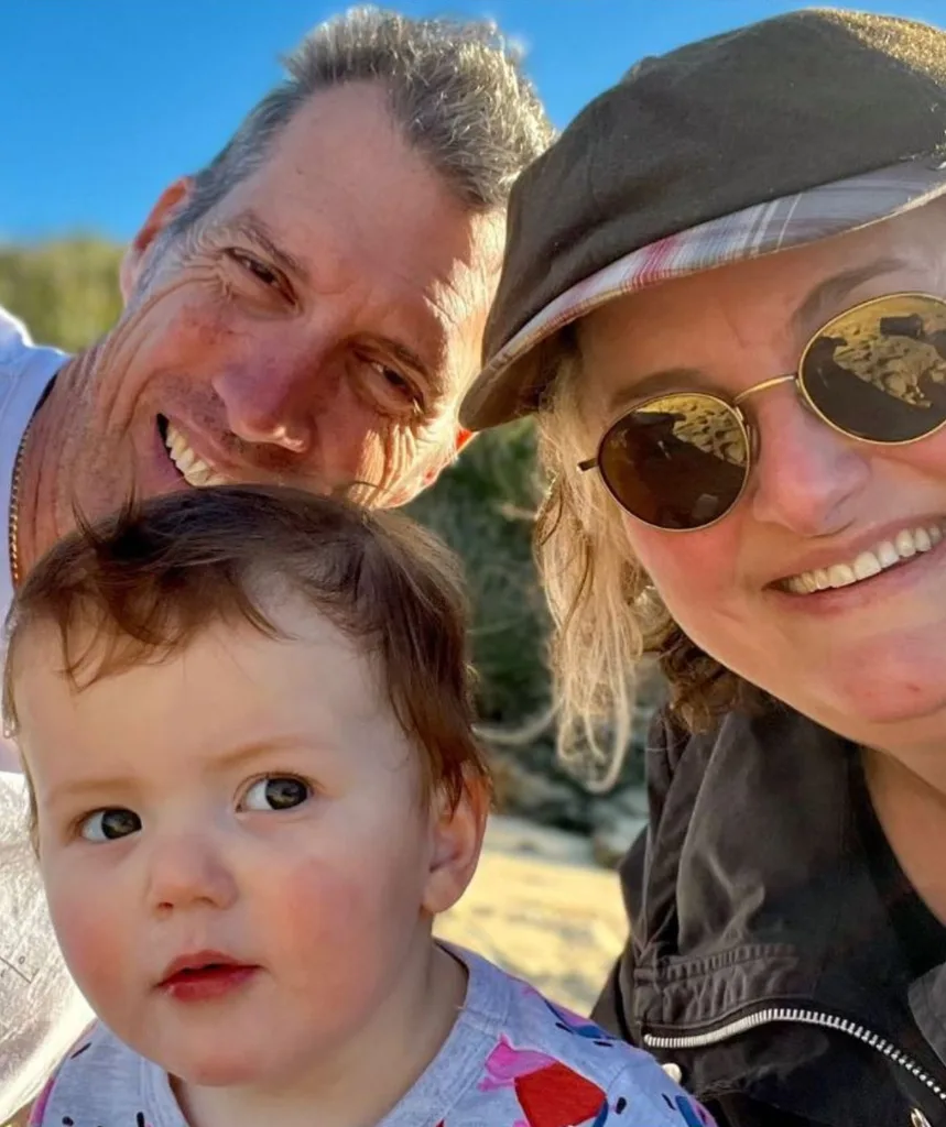 Julie Goodwin poses for a selfie with her family.