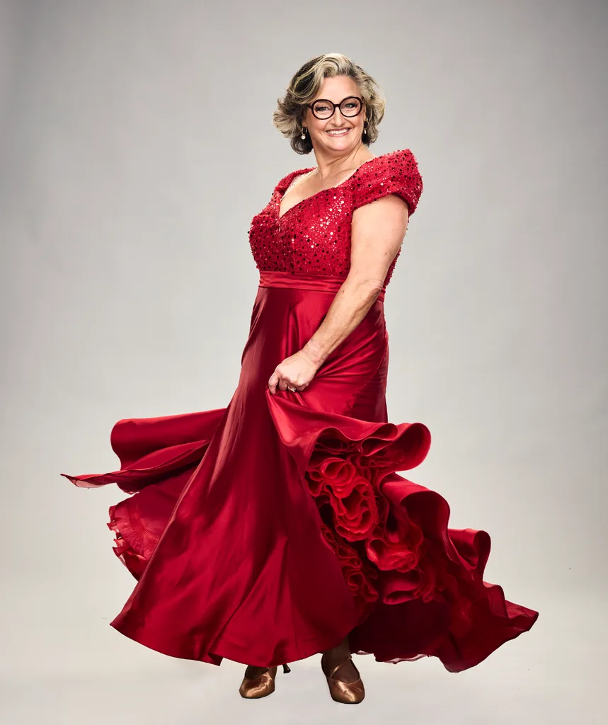 Julie Goodwin wears a red dress perfect for Dancing With The Stars