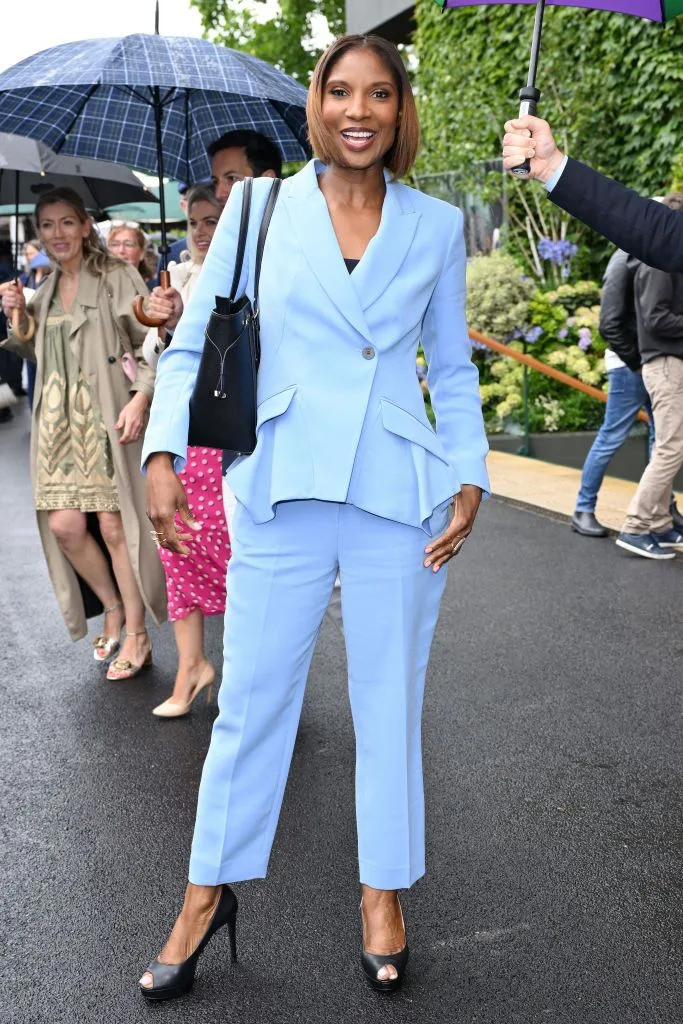 denise lewis wearing a sky blue suit