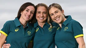 Marathon runners Sinead Diver, Genevieve Gregson and Jessica Stenson smiling to camera.