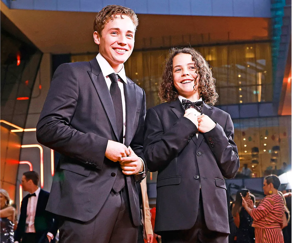 Lee Tiger Halley and Felix Cameron the Logies stage in suits