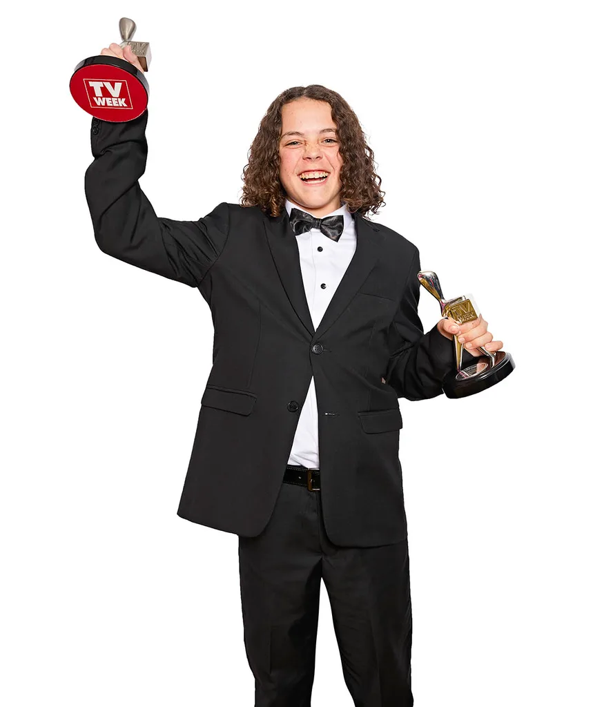 Felix Cameron celebrating his two wins on the night, Best Actor and Most Popular New Talent