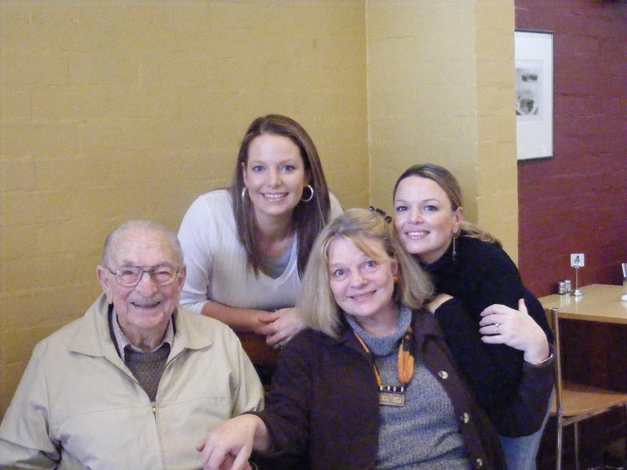 Libby Mitchell with her dad (far left) and her daughters, Christine (left) and Belinda (Right)