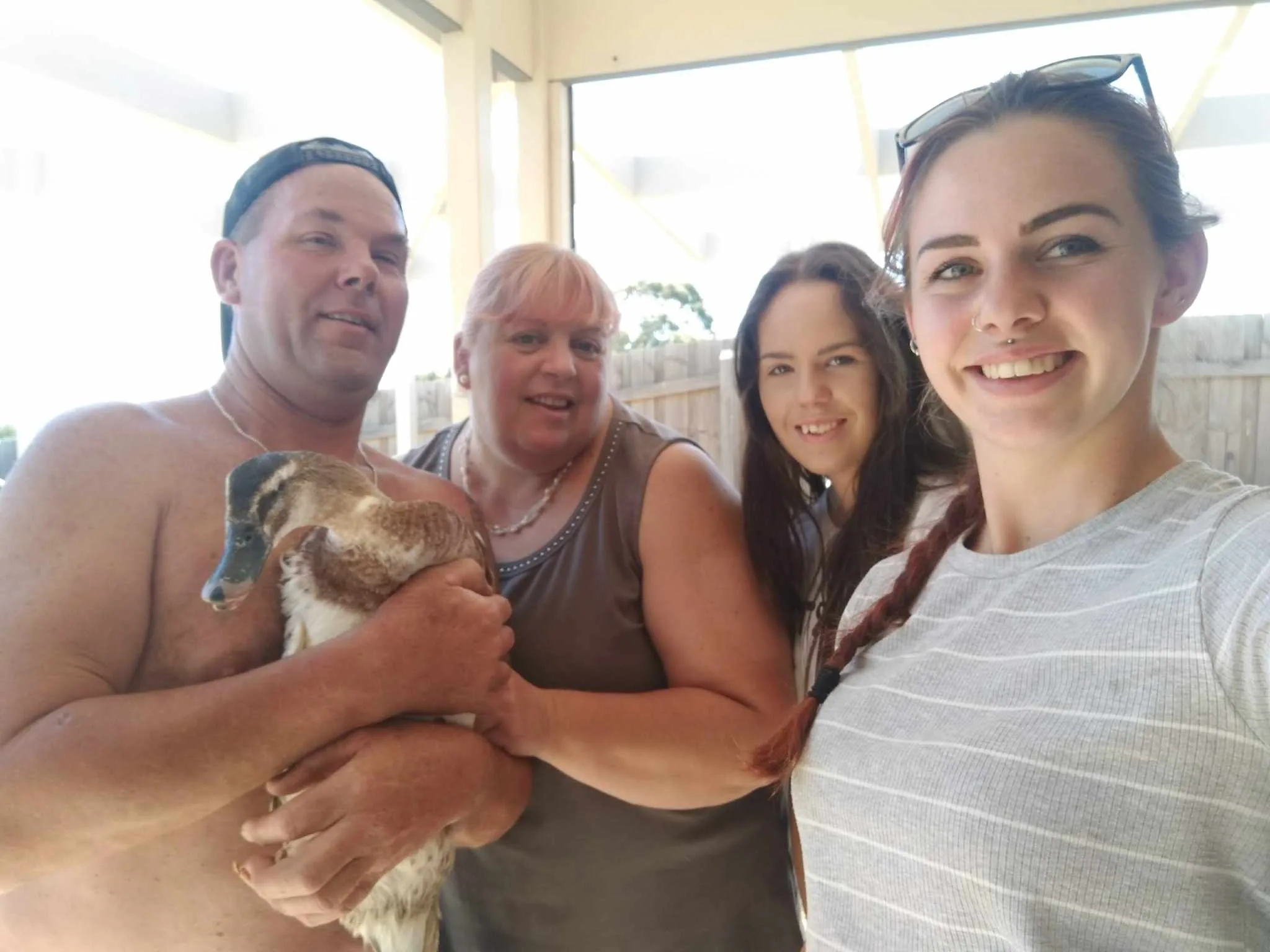 Alan (father), Elizabeth (mother), Abbey, Emily (myself, sister) pictured with Andrea (pet duck)