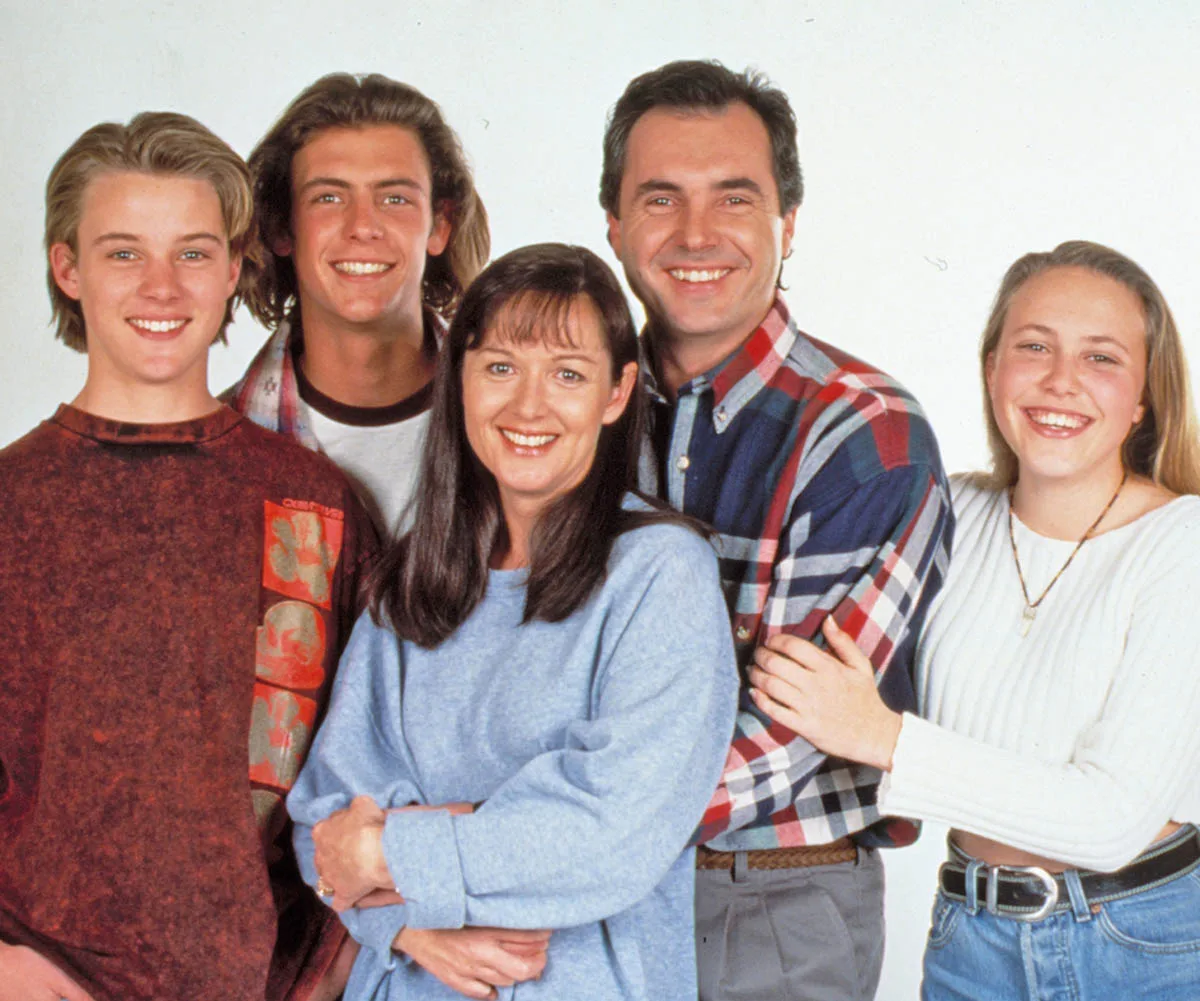 A group shot of the actors who played the Kennedy family on Neighbours, including Jesse Spencer.