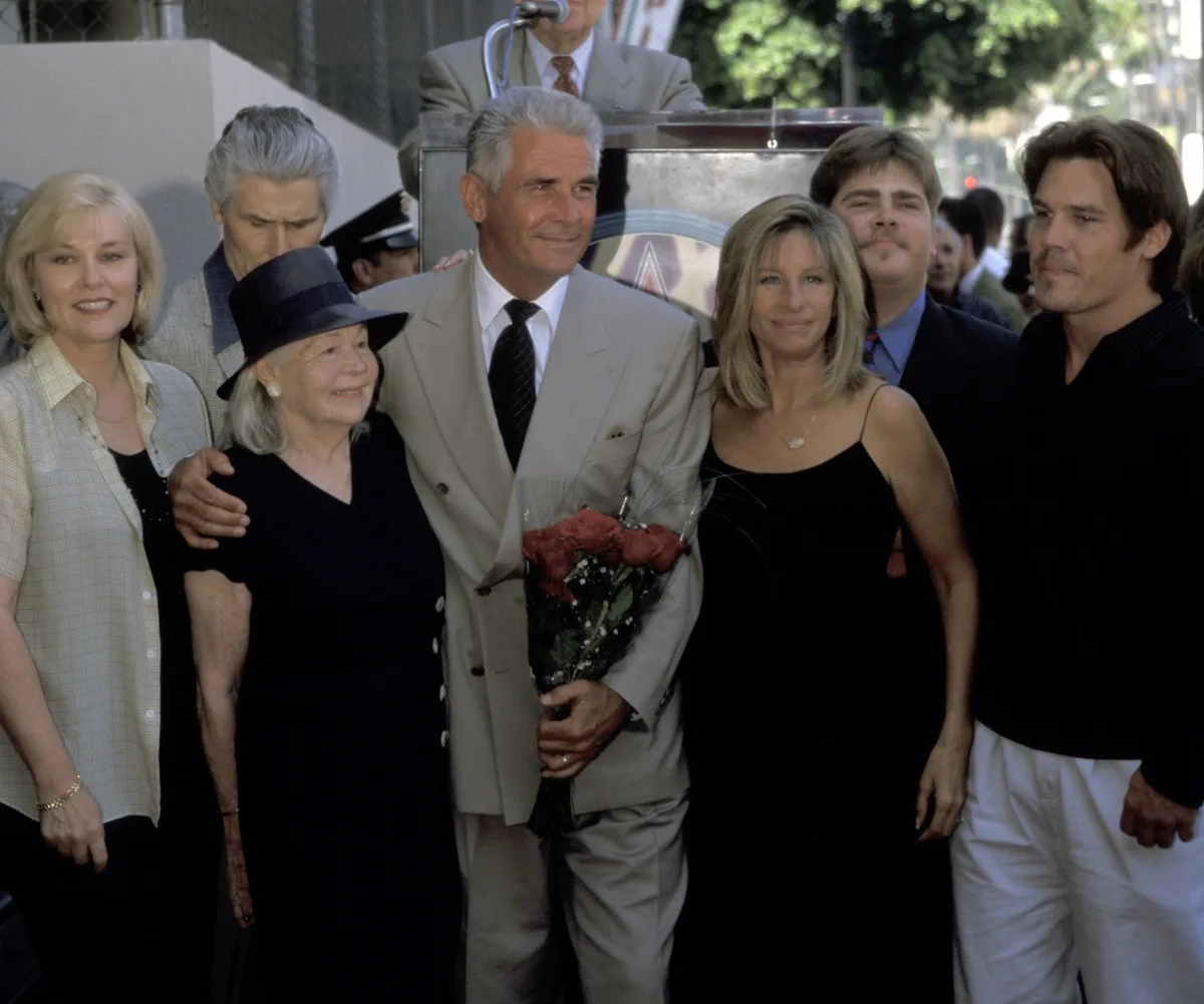 An image of Barbra Streisand, James, Josh and Jess Brolin in happier times.