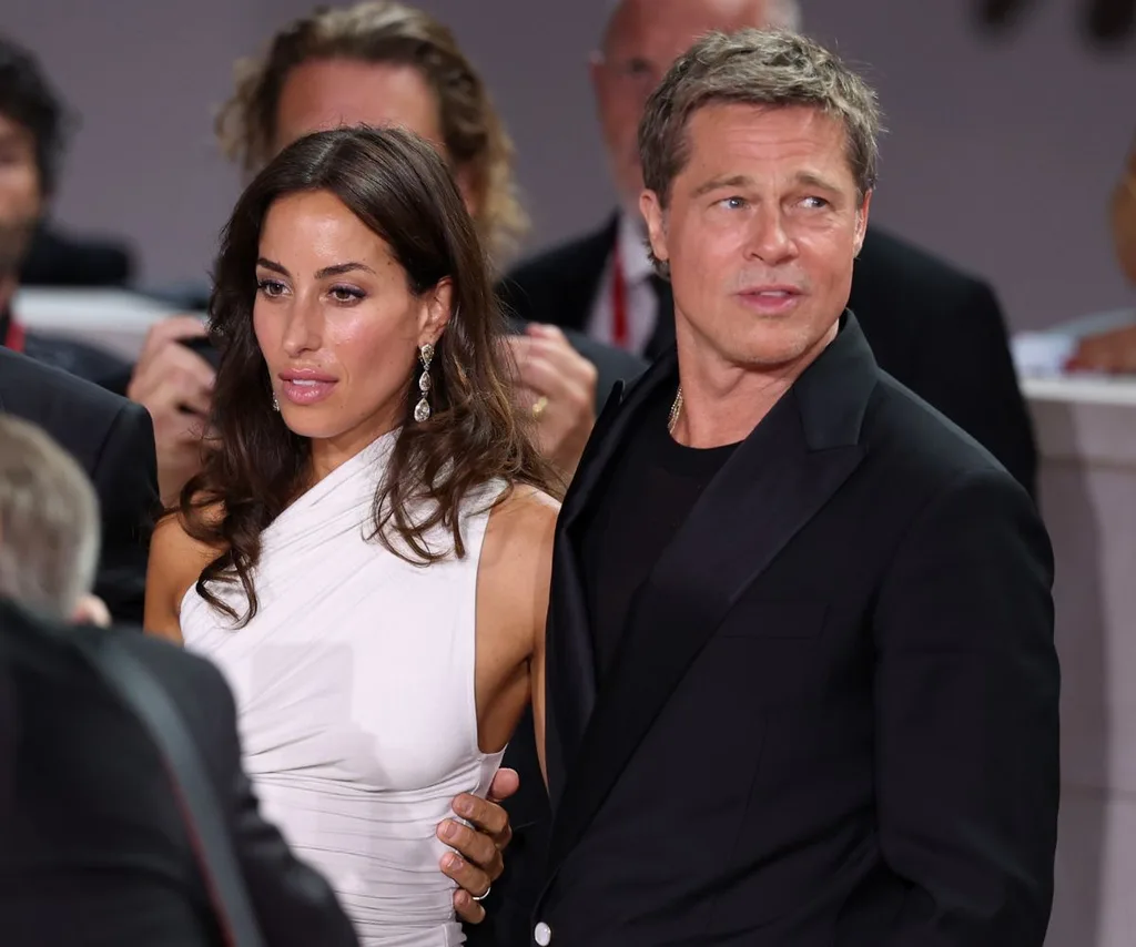 Brad Pitt and girlfriend Ines de Ramon went red carpet official in Venice.