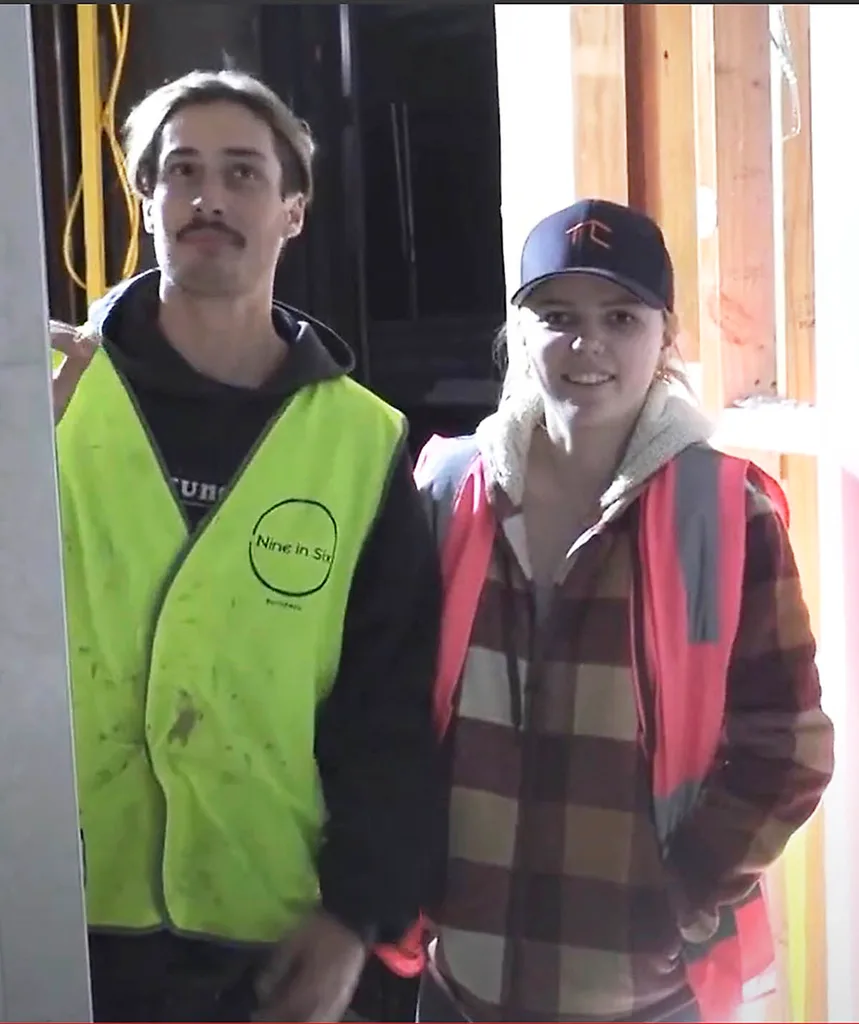 Jack and Charlotte both in hi vis on site