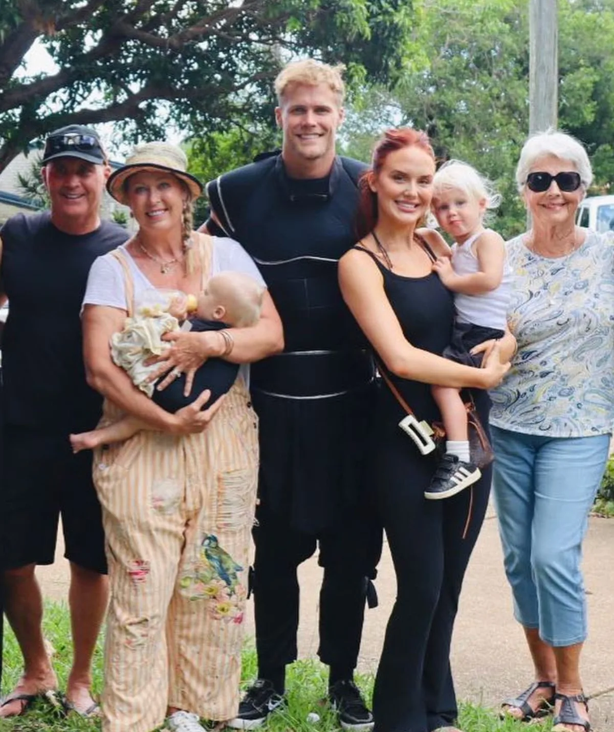 Jett Kenny and Lily Brown with swimmer Lisa Curry and canoeist Grant Kenny.