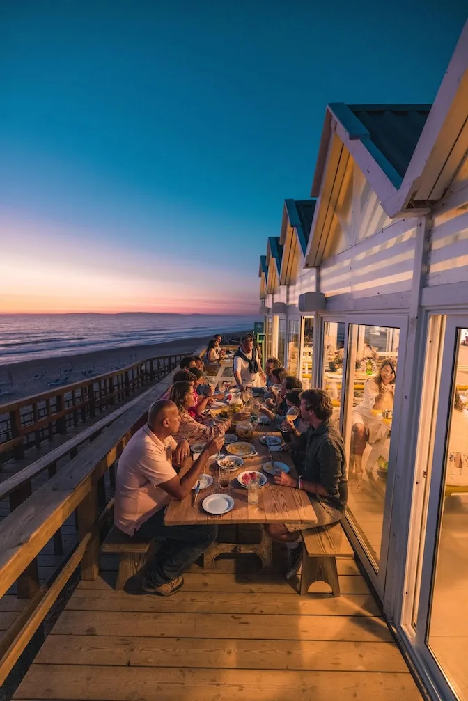 People enjoying dinner outside CostaTerra Golf and Ocean Club