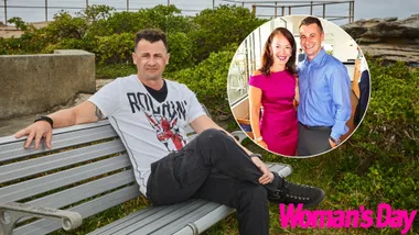 Anthony Koletti is sitting on a bench with the ocean behind him. There is a smaller inset image of Anthony next to his wife Melissa Caddick.